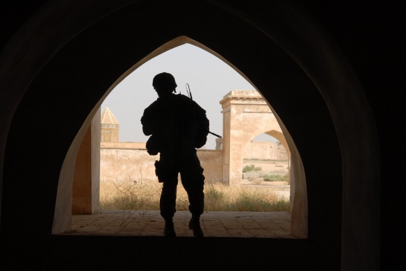 071015-F-7418E-136Army 2nd Lt. Andrew Archer is framed by an arch at the citadel in Kirkuk, Iraq, on Oct. 15, 2007.  Archer, of Delta Company, 2nd Battalion, 22nd Infantry Regiment, 1st Brigade Combat Team, 10th Mountain Division and civilians from the Kirkuk Provincial Reconstruction Team toured the historic site in Kirkuk.  DoD photo by Staff Sgt. Dallas Edwards, U.S. Air Force.  (Released)